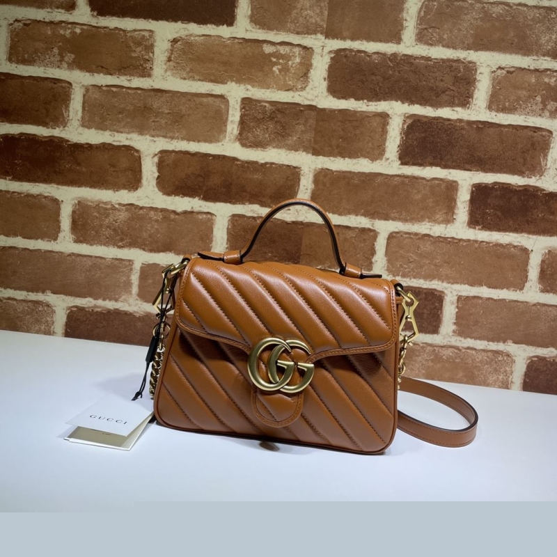 G*u*i top handle bags
